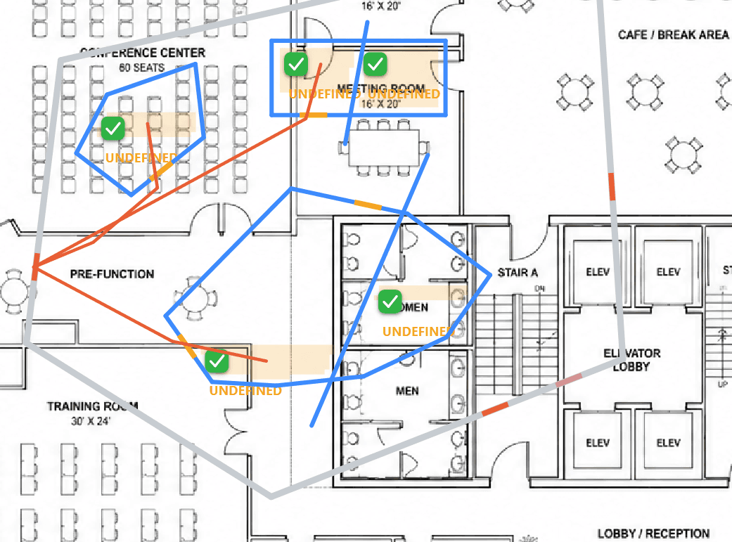 Floor plan overlaid with computed escape routes, fire zones and compliant room ticks